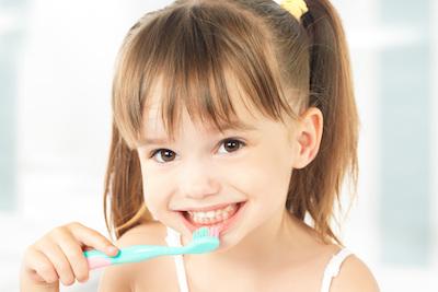 A child brushing her teeth in Annapolis, MD.