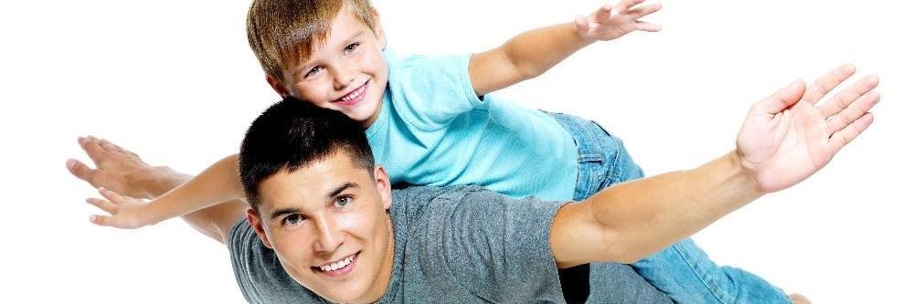 Father and son playing after general dentistry in Annapolis, MD