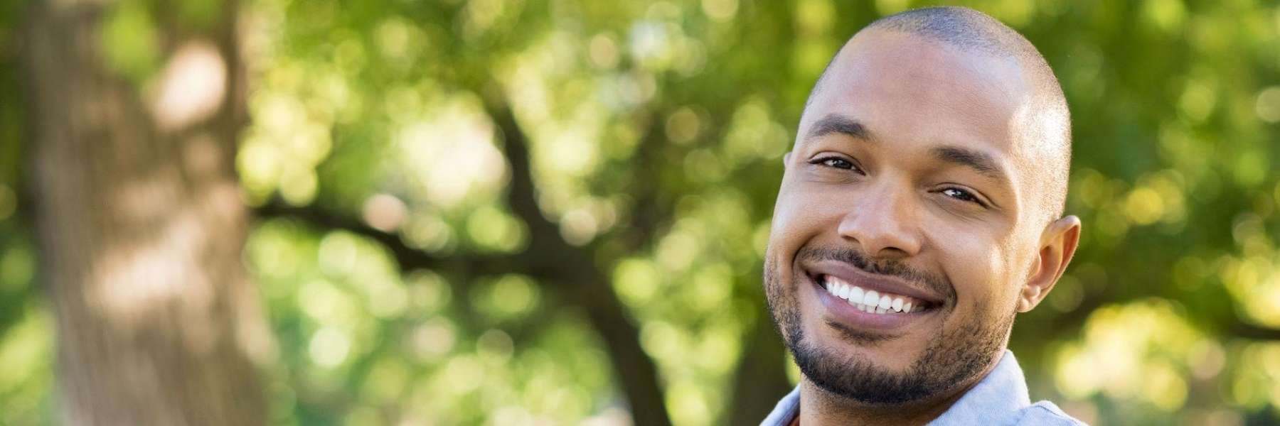 Man smiling after getting dental crowns in Annapolis, MD