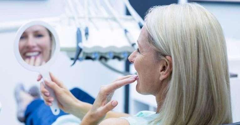 A patient relieved after a Tooth Extraction in Annapolis, MD