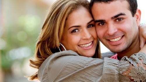 Couple smiling after undergoing cosmetic dentistry in Annapolis, MD