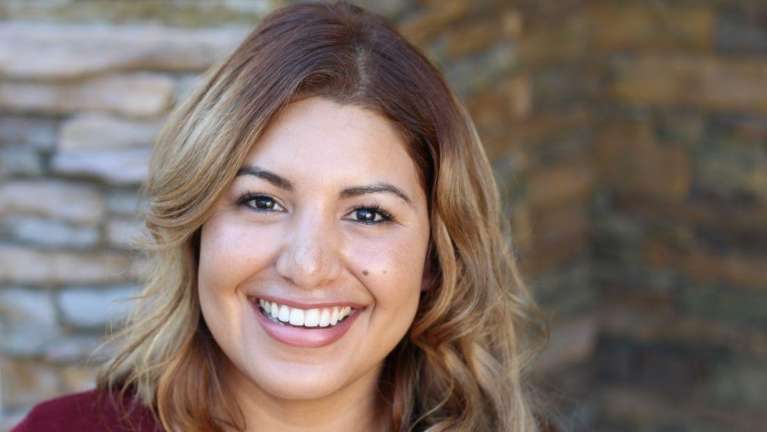 Lady smiling after getting dental implants in Annapolis, MD