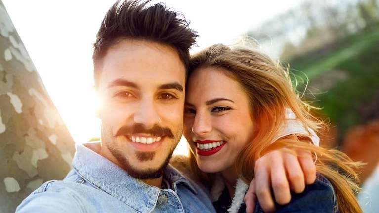 a happy couple with cosmetic dentistry in Annapolis, MD