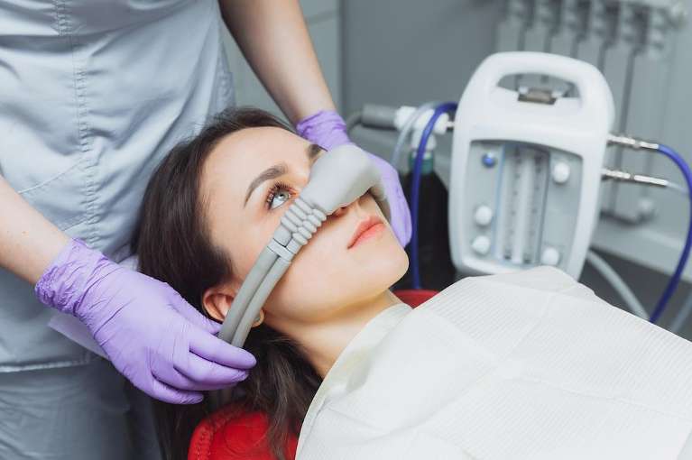 A patient getting Nitrous oxide dental sedation in Annapolis, MD 